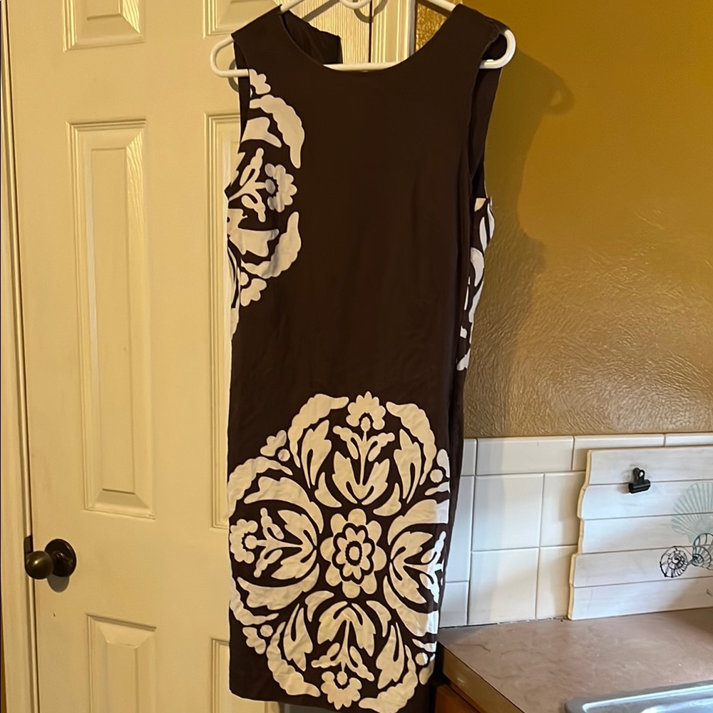 Elegant Brown and light cream Sleeveless Dress. Pit to pit 15”. Size 8.